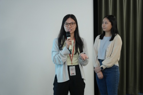 Presenting on stage at an OCBC event